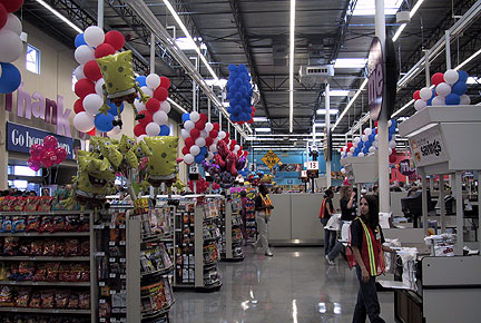 BALLOONS TO WELCOME THE CROWD AS THEY ENTER THE GROCERY