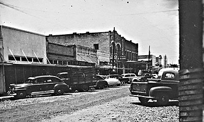Another view of street widening of Main Street in downtown Bastrop (facing north) in the early 1950's