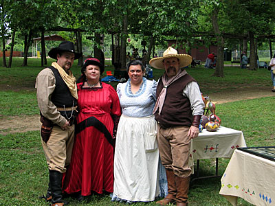 The Texas Pistolaros, gunfight re-enactors, in action. This group performed skits and some pose here before performances.