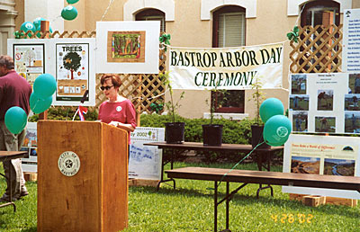 Nancy Scott, wife of Mayor Tom Scott, gives welcoming at Arbor Day Ceremony.